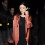 Kylie Jenner Wears Red Satin Jacket at London Eye